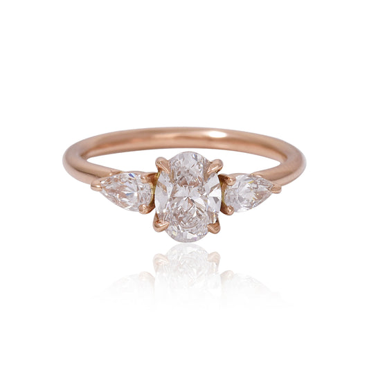 Oval and Pearshape three stone ring